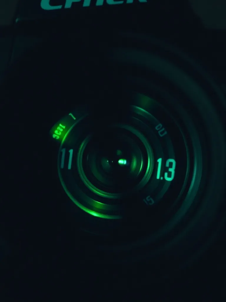 Close up of a professional camera lens with digital overlay